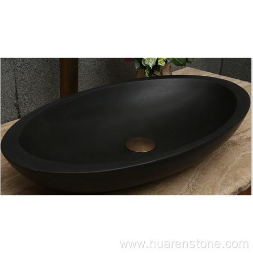 Oval honed natural black lava stone vessel sink